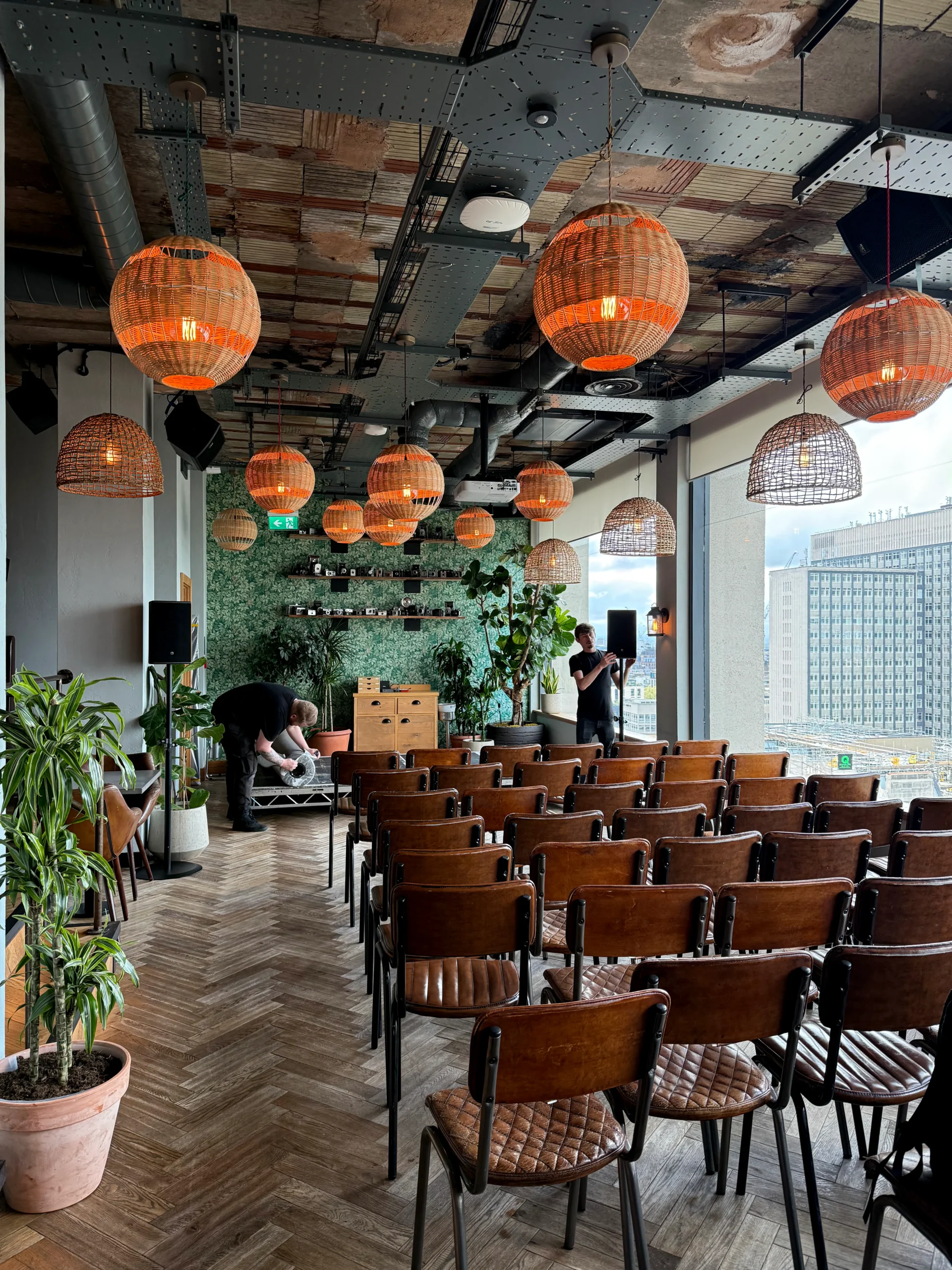 AV team setting up staging and sound for corporate event in London