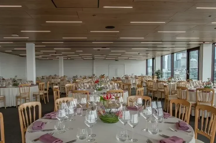 Rose Court daytime corporate lunch setup with formal seated dining and panoramic London skyline views