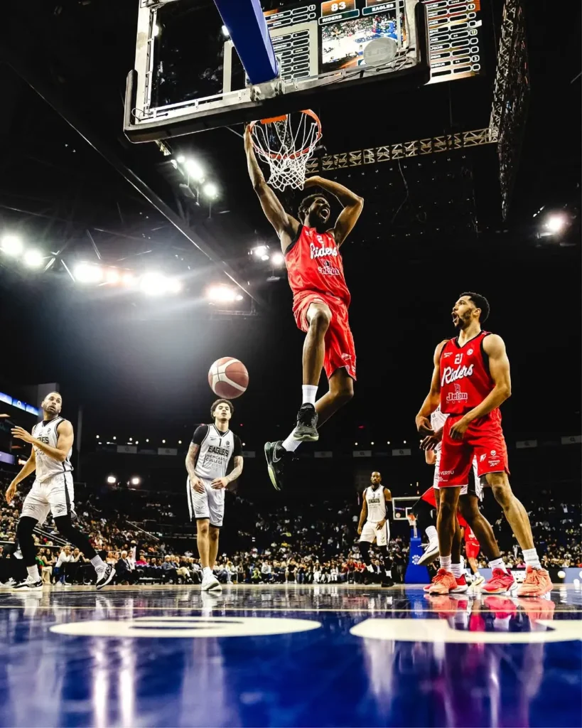 Live basketball dunk during SLB Play-Off Finals 2025 at The O2 Arena with full arena lighting and scoreboard display