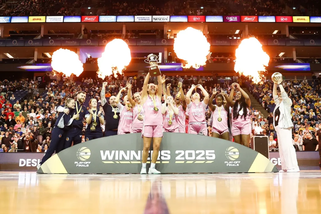 SLB Women’s Play-Off Finals 2025 winners lifting the trophy at The O2 Arena with pyrotechnics and crowd celebration