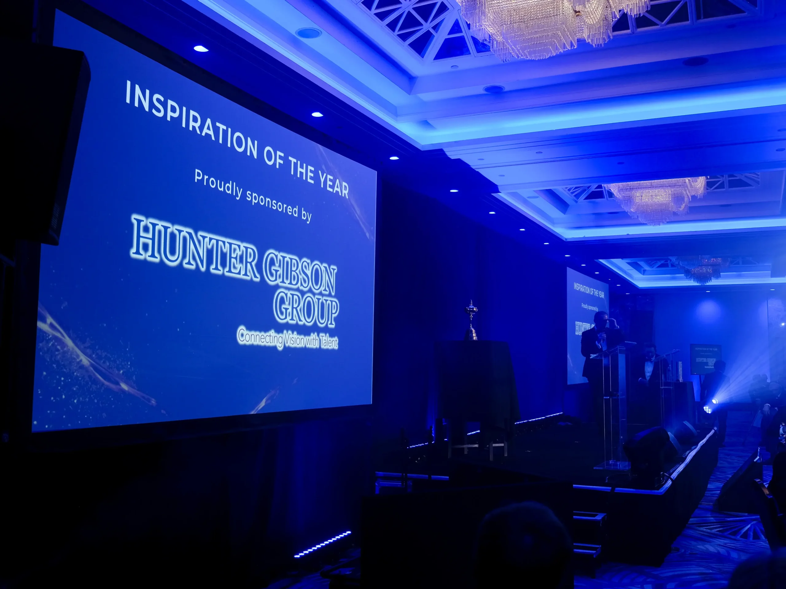 Large presentation screen displaying award sponsor branding at Sporting Club Awards Gala 2025 in London