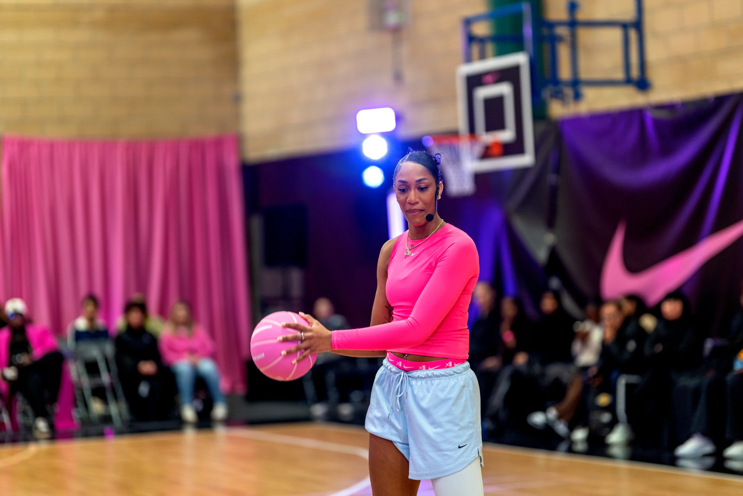 A’ja Wilson using headset microphone during basketball session