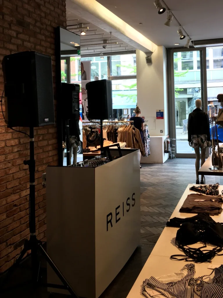 Retail DJ booth and in-store sound system setup for Reiss in London