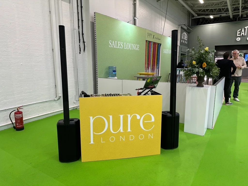 Branded DJ booth for the Pure London fashion exhibition and retail activation.