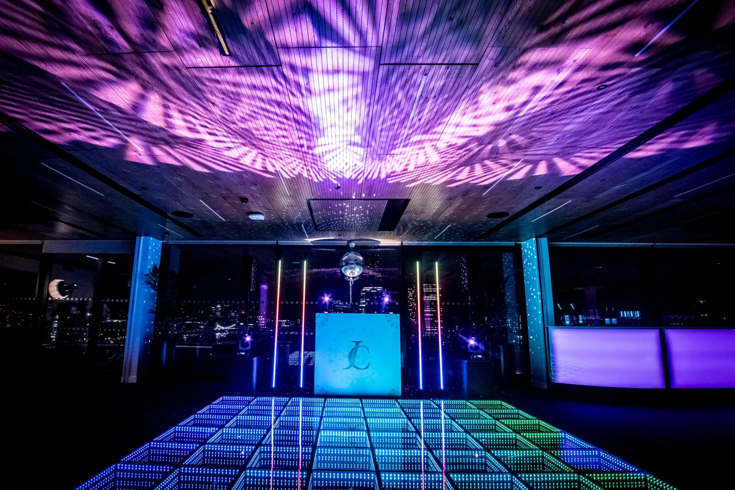 Custom printed DJ booth with a personalised monogram for a luxury wedding in London.