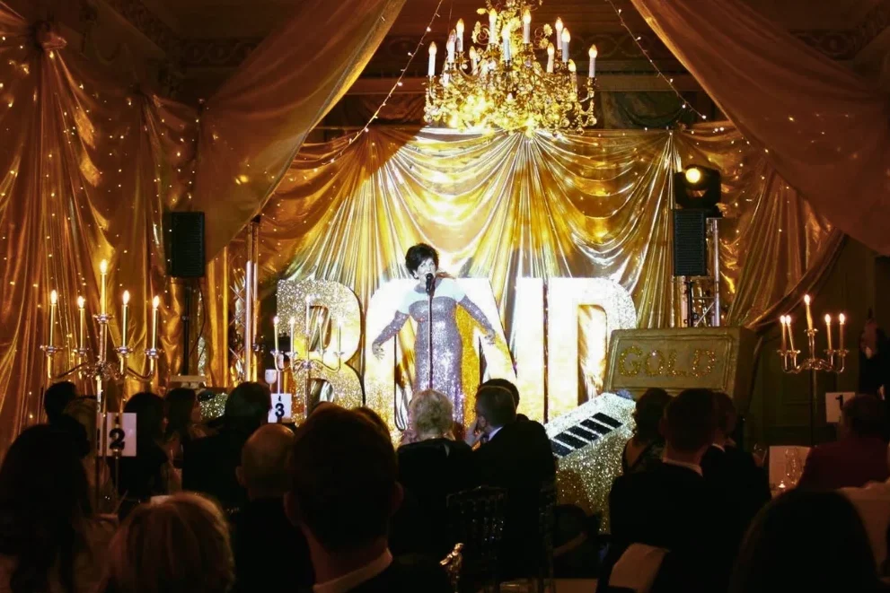 Themed wedding reception with custom decor, lighting and entertainment at Home House London