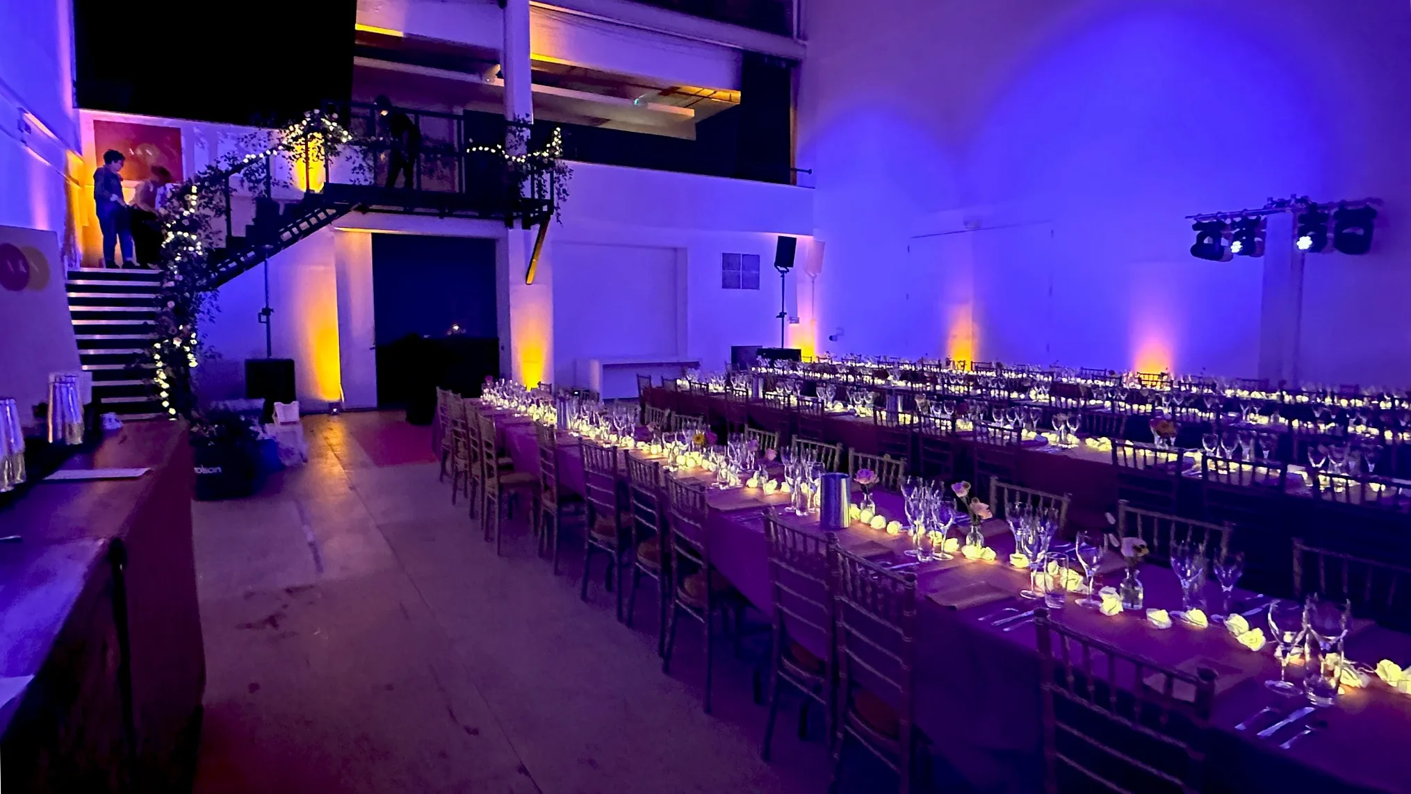 Wedding reception with architectural uplighting and table lighting
